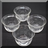 K41. Set of 4 small glass bowls. 4”d - $8 
